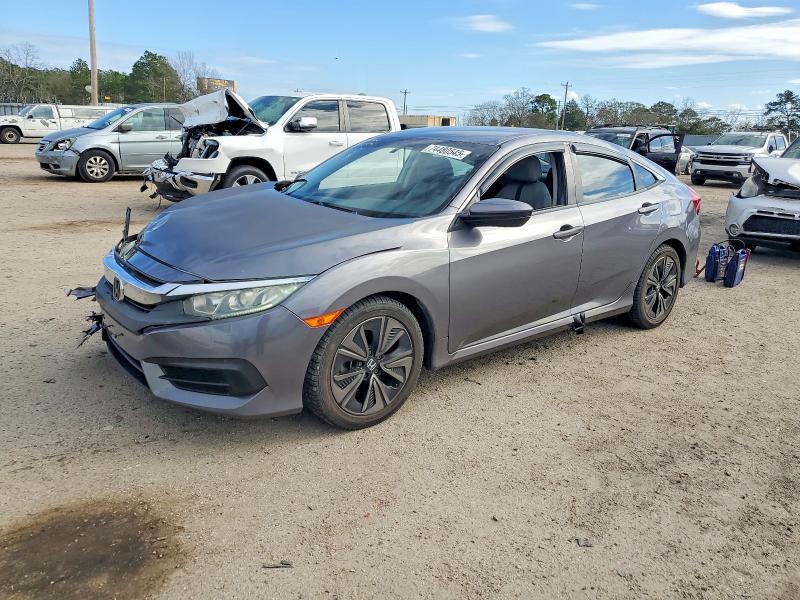 HONDA CIVIC 2017 with VIN 19XFC2F52HE080954 - Photo from auction
