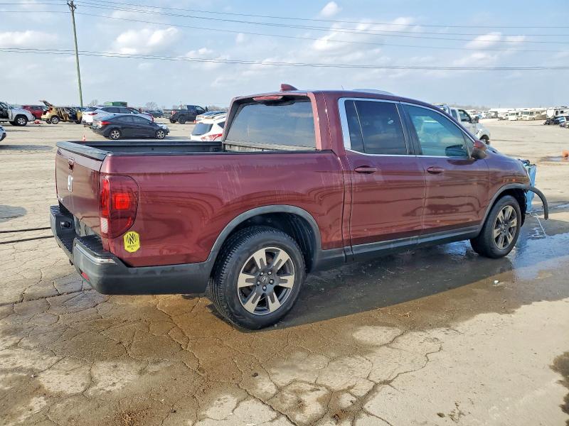 Photo 3 from auction – 2017 HONDA RIDGELINE with VIN 5FPYK2F59HB011594
