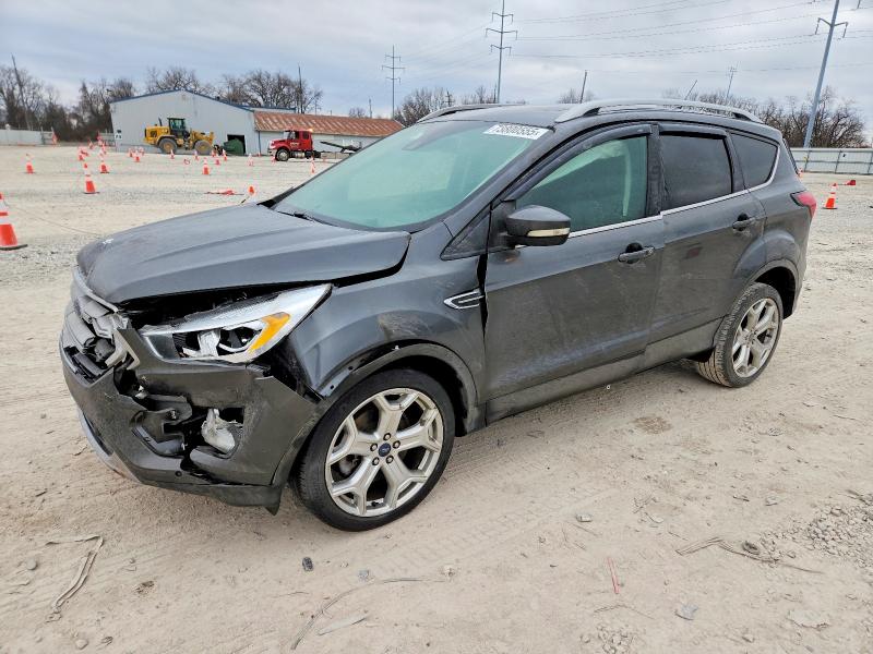 FORD ESCAPE 2019 with VIN 1FMCU9J98KUB54952 - Photo from auction