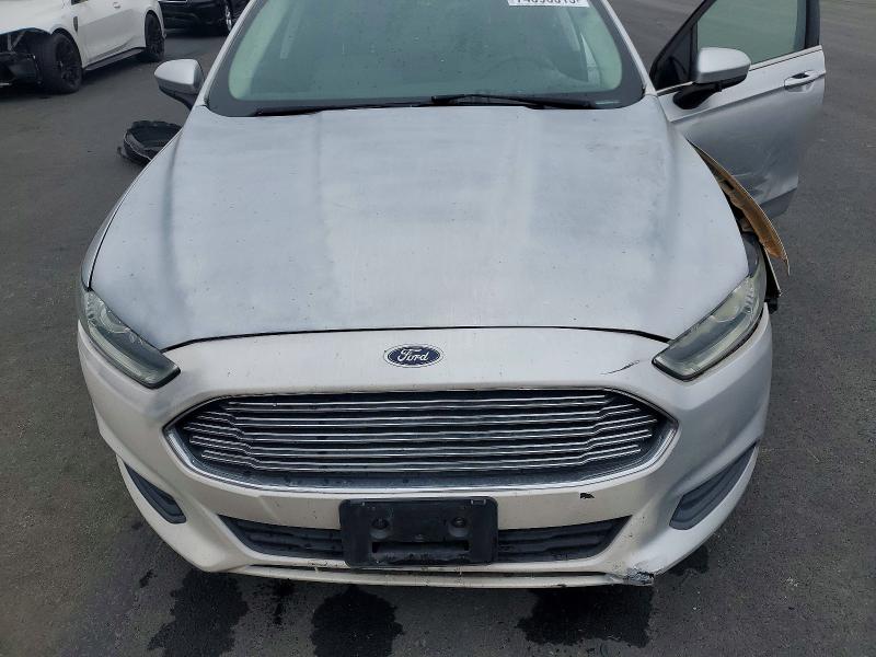 Photo 11 from auction – 2016 FORD FUSION S H with VIN 3FA6P0UU7GR285105