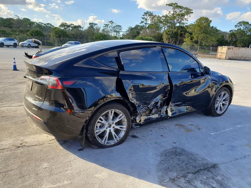 Photo 3 from auction – 2023 TESLA MODEL Y with VIN 7SAYGAEE0PF942010