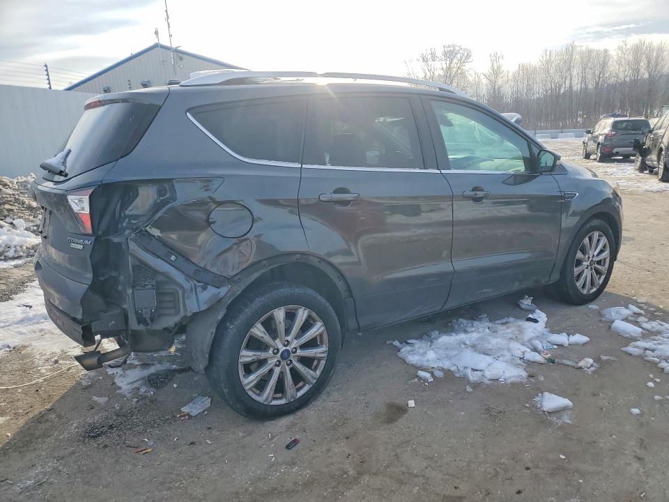 Photo 3 from auction – 2017 FORD ESCAPE with VIN 1FMCU0JD5HUD18599