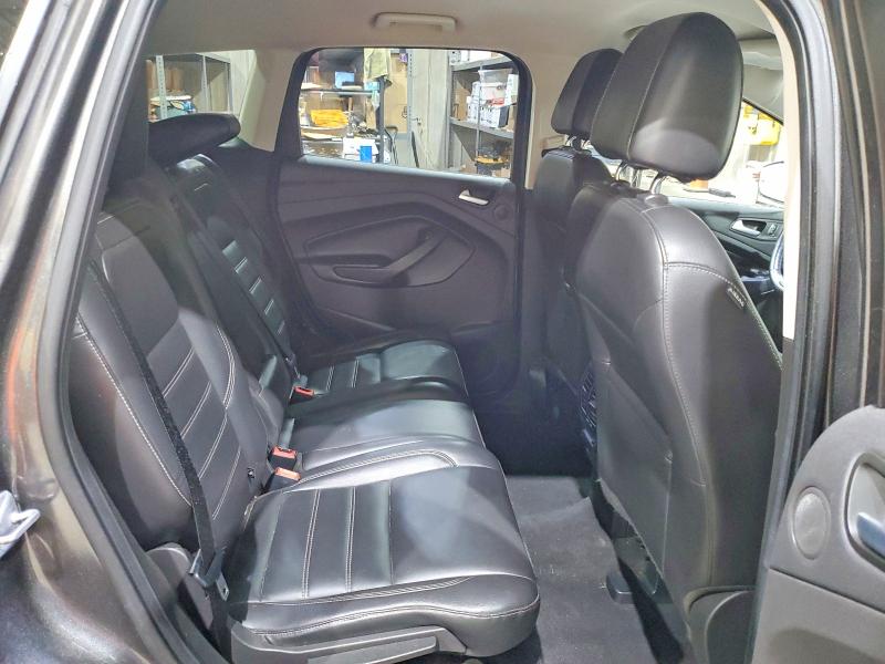 Photo 11 from auction – 2017 FORD ESCAPE SE with VIN 1FMCU9GD6HUC05594