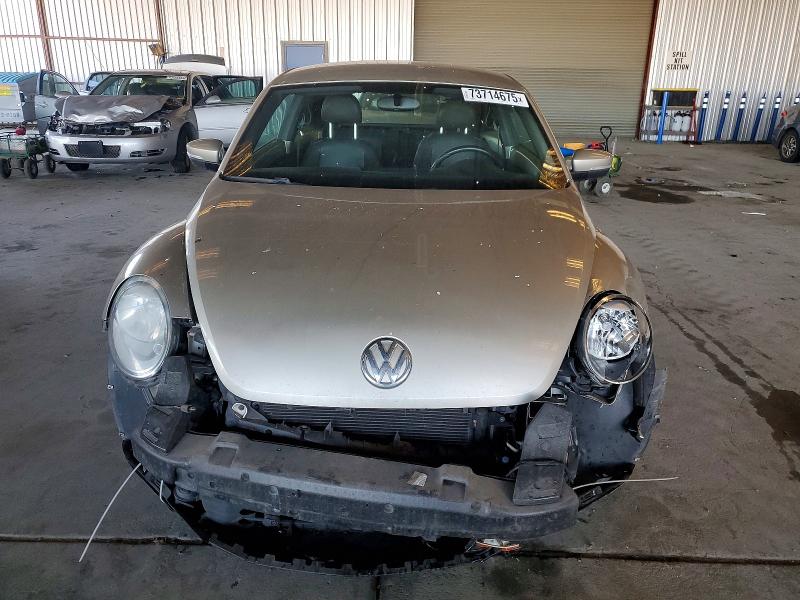 Photo 5 from auction – 2012 VOLKSWAGEN BEETLE with VIN 3VWJP7AT0CM659518