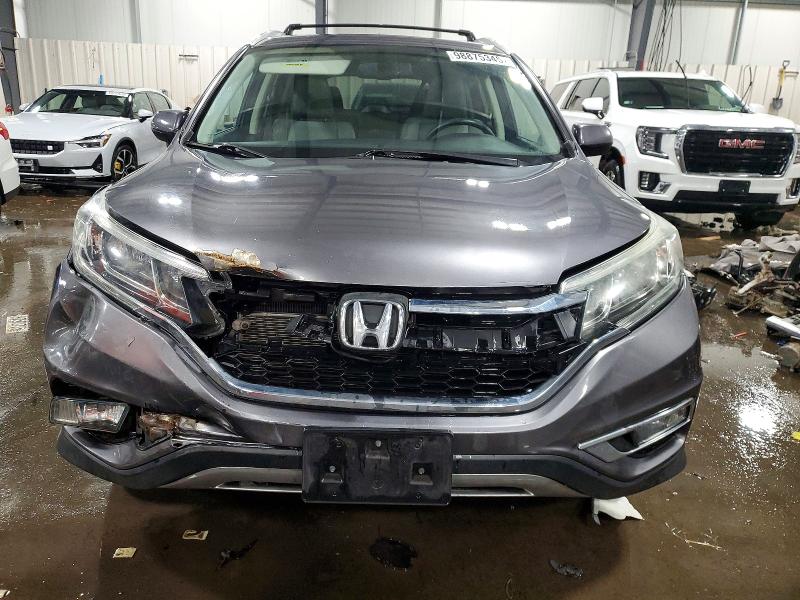 Photo 5 from auction – 2015 HONDA CR-V EXL with VIN 5J6RM4H77FL035608