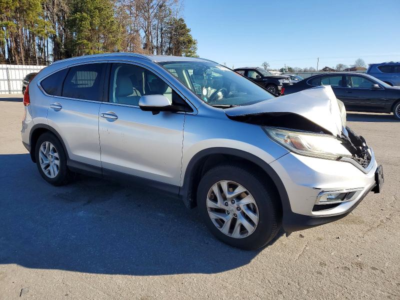 Photo 4 from auction – 2015 HONDA CR-V EXL with VIN 2HKRM3H71FH538880