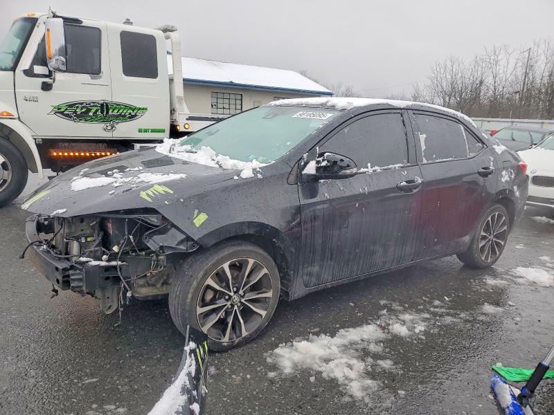 TOYOTA COROLLA 2017 with VIN 2T1BURHE2HC823385 - Photo from auction