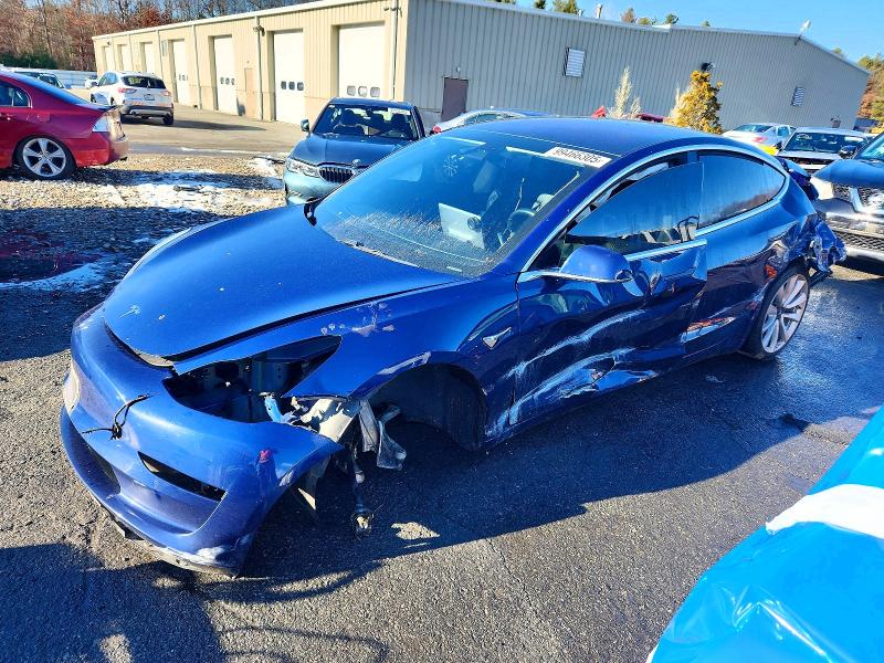 TESLA MODEL 3 2018 with VIN 5YJ3E1EB9JF116086 - Photo from auction