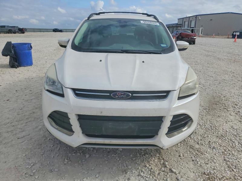Photo 5 from auction – 2013 FORD ESCAPE with VIN 1FMCU0H90DUB40130