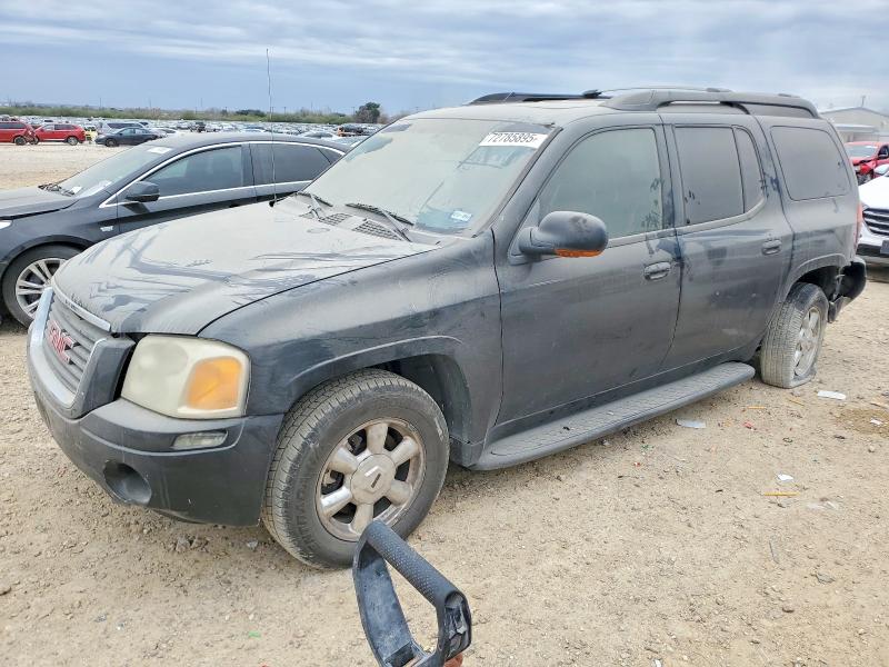 GMC ENVOY 2003 with VIN 1GKES16S136110060 - Photo from auction