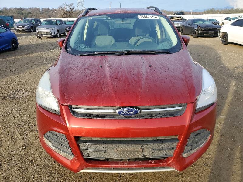 Photo 5 from auction – 2014 FORD ESCAPE with VIN 1FMCU9GX8EUE12770
