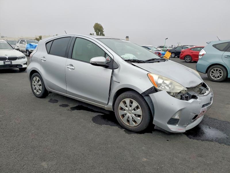 Photo 4 from auction – 2014 TOYOTA PRIUS C with VIN JTDKDTB31E1571021