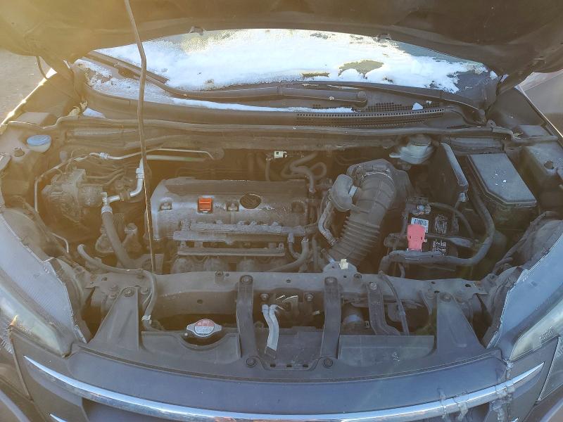 Photo 11 from auction – 2014 HONDA CR-V with VIN 2HKRM4H79EH620666