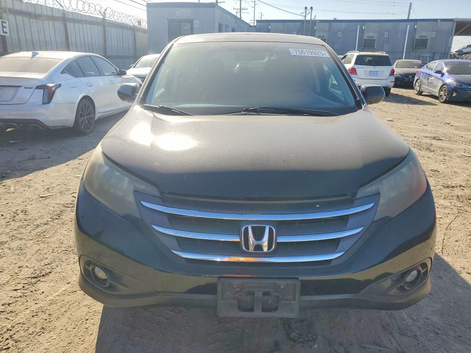 Photo 5 from auction – 2014 HONDA CR-V with VIN 2HKRM3H50EH515300
