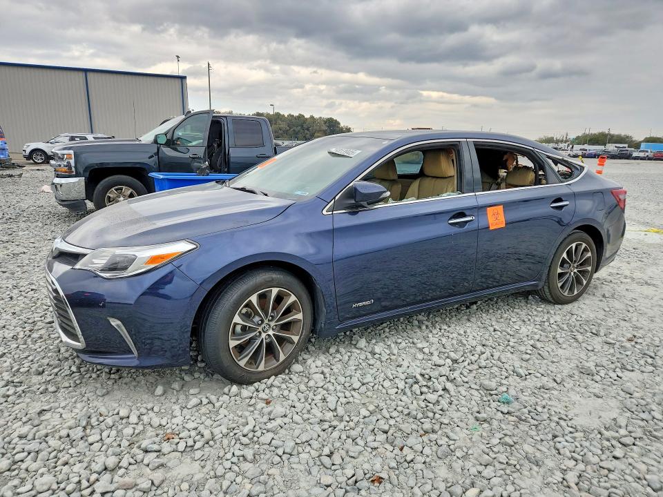 TOYOTA AVALON HYB 2016 with VIN 4T1BD1EB3GU050984 - Photo from auction