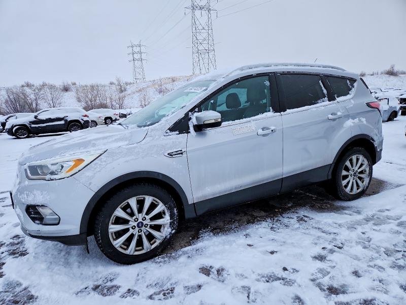 FORD ESCAPE 2017 with VIN 1FMCU0JD9HUA15180 - Photo from auction