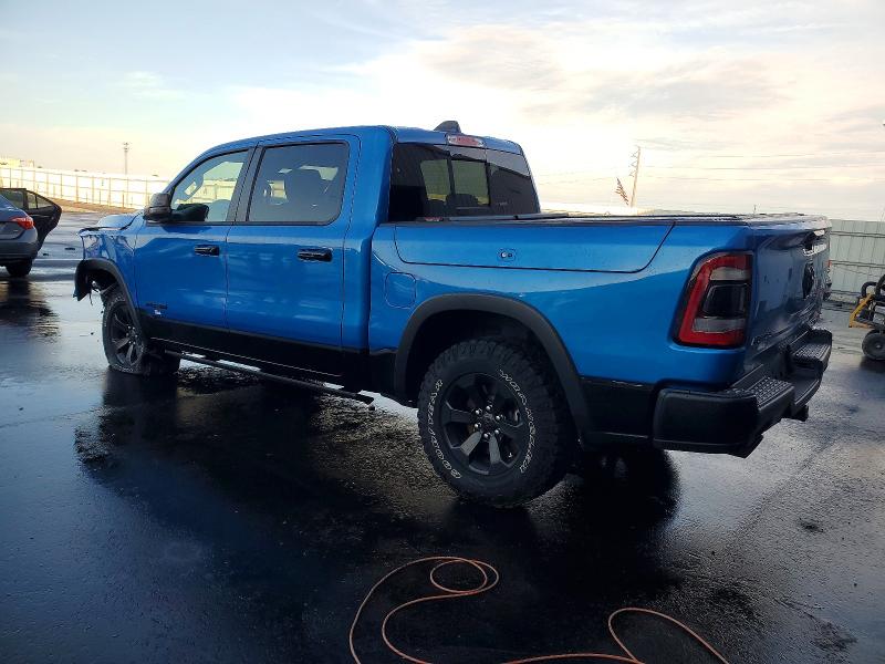 Photo 2 from auction – 2023 RAM 1500 with VIN 1C6RRELT8PN572924