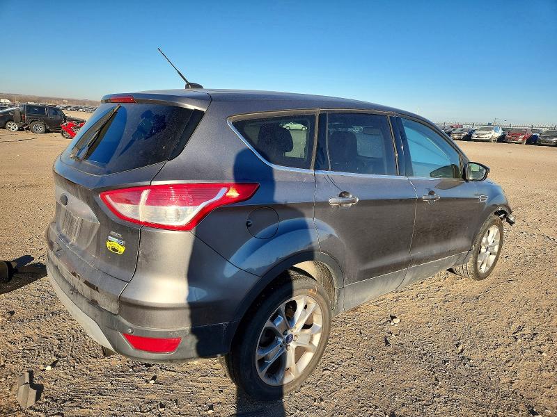 Photo 3 from auction – 2013 FORD ESCAPE with VIN 1FMCU9HX6DUC36959