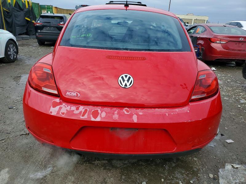 Photo 6 from auction – 2013 VOLKSWAGEN BEETLE with VIN 3VWFP7AT4DM645192