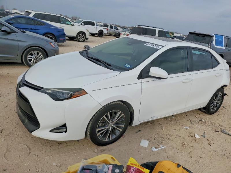 TOYOTA COROLLA L 2018 with VIN 2T1BURHE9JC018778 - Photo from auction