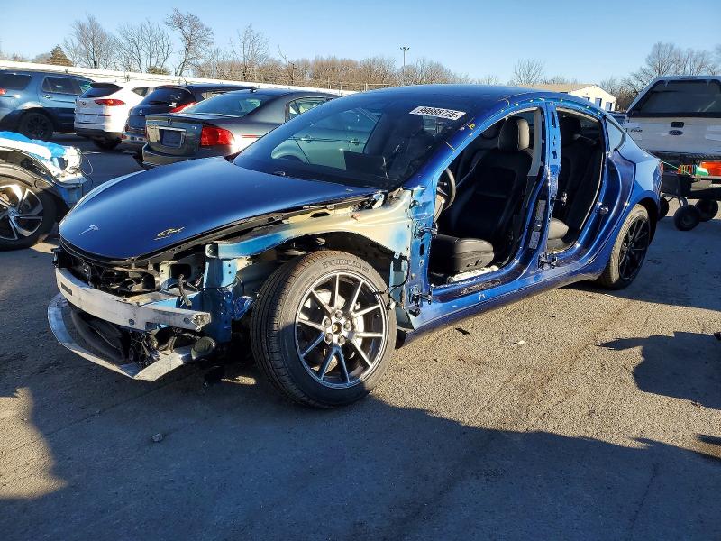 TESLA MODEL 3 2021 with VIN 5YJ3E1EB1MF988380 - Photo from auction