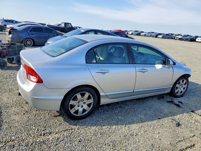 Photo 3 from auction – 2010 HONDA CIVIC LX with VIN 19XFA1F51AE069644