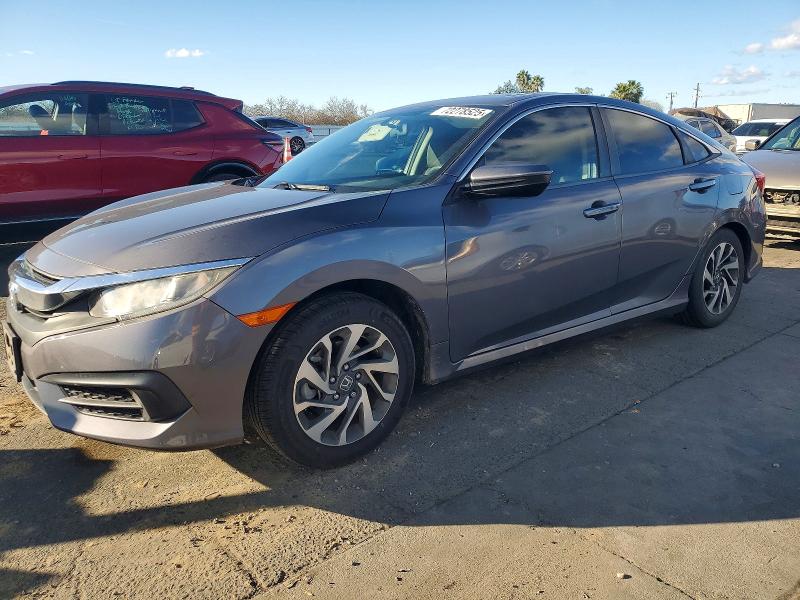 HONDA CIVIC EX 2017 with VIN 19XFC2F78HE230812 - Photo from auction