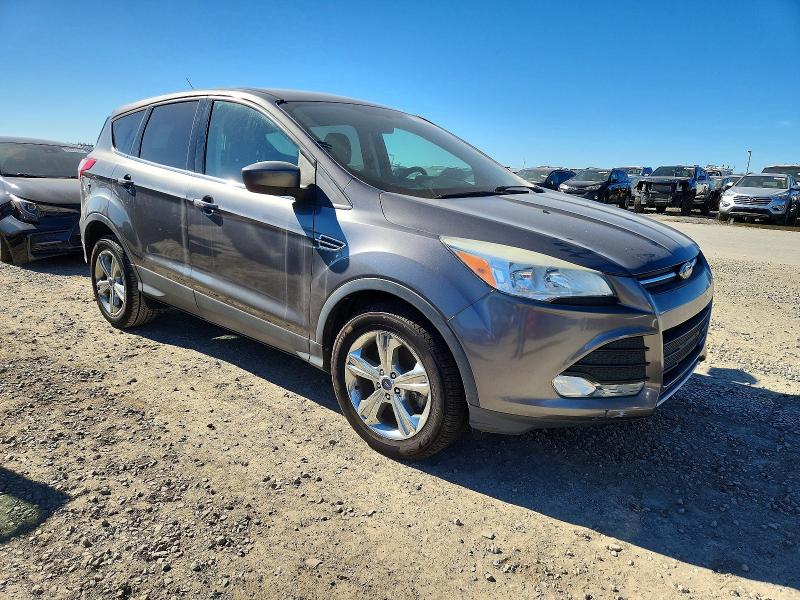 Photo 4 from auction – 2014 FORD ESCAPE SE with VIN 1FMCU0G99EUA14741