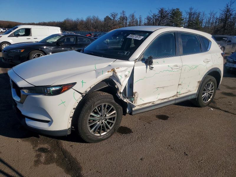 MAZDA CX-5 SPORT 2018 with VIN JM3KFBBM2J0337765 - Photo from auction