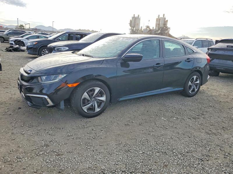HONDA CIVIC 2019 with VIN 19XFC2F63KE211938 - Photo from auction