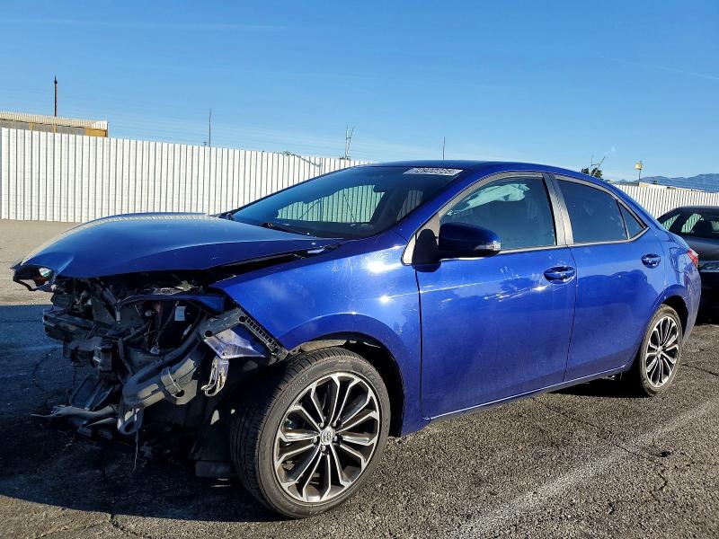 TOYOTA COROLLA L 2014 with VIN 5YFBURHE3EP097306 - Photo from auction
