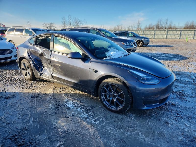 Photo 4 from auction – 2022 TESLA MODEL 3 with VIN 5YJ3E1EB9NF163964