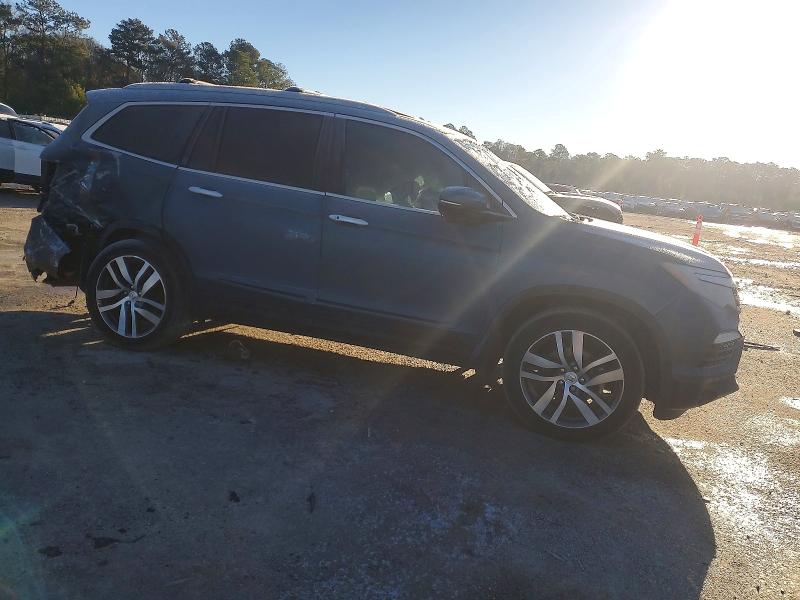 Photo 4 from auction – 2018 HONDA PILOT TOUR with VIN 5FNYF5H94JB015752