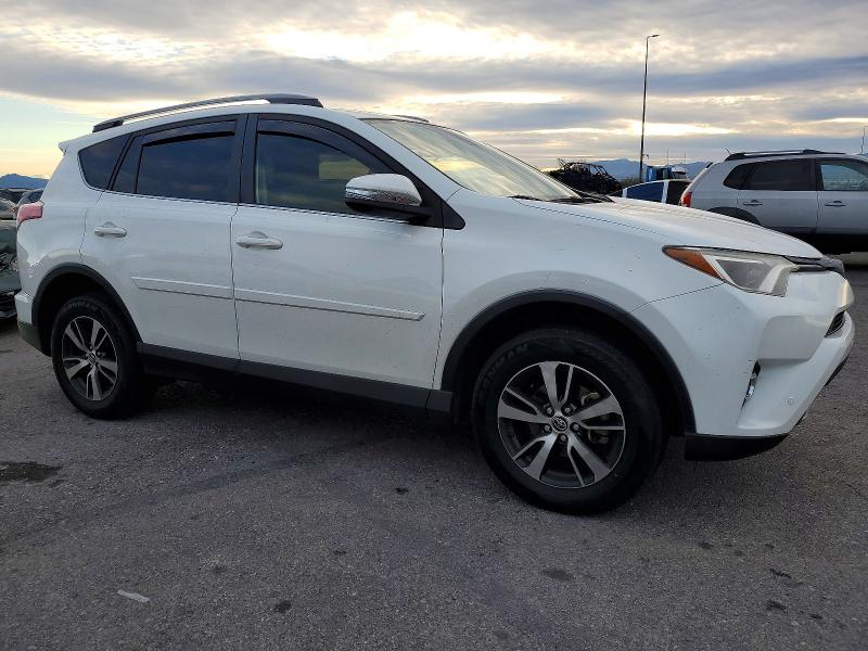 Photo 4 from auction – 2017 TOYOTA RAV4 XLE with VIN JTMWFREV7HJ714361