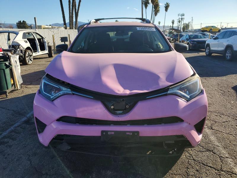 Photo 5 from auction – 2017 TOYOTA RAV4 LE with VIN JTMZFREV9HJ711300