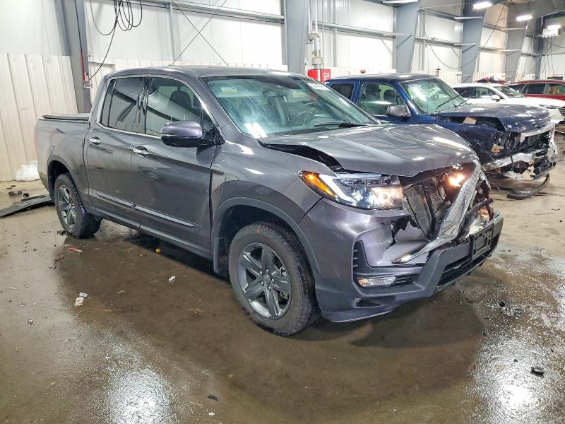 Photo 4 from auction – 2023 HONDA RIDGELINE with VIN 5FPYK3F73PB053846