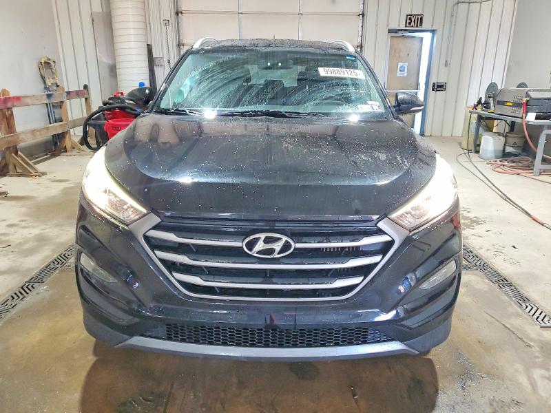 Photo 5 from auction – 2016 HYUNDAI TUCSON LIM with VIN KM8J3CA22GU075438
