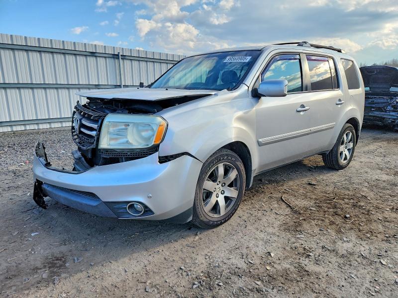 HONDA PILOT TOUR 2014 with VIN 5FNYF4H97EB011937 - Photo from auction