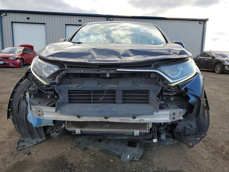 Photo 5 from auction – 2018 HONDA CR-V with VIN 2HKRW6H34JH214064