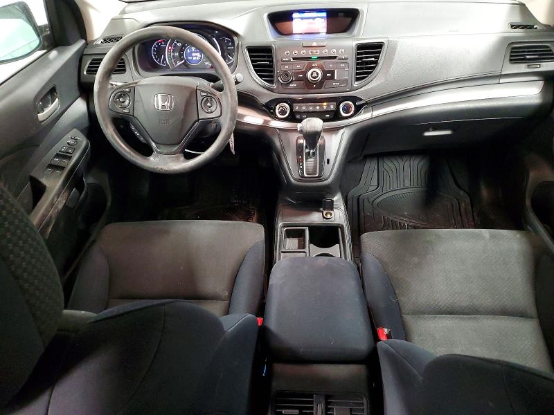 Photo 8 from auction – 2015 HONDA CR-V LX with VIN 2HKRM4H33FH691828