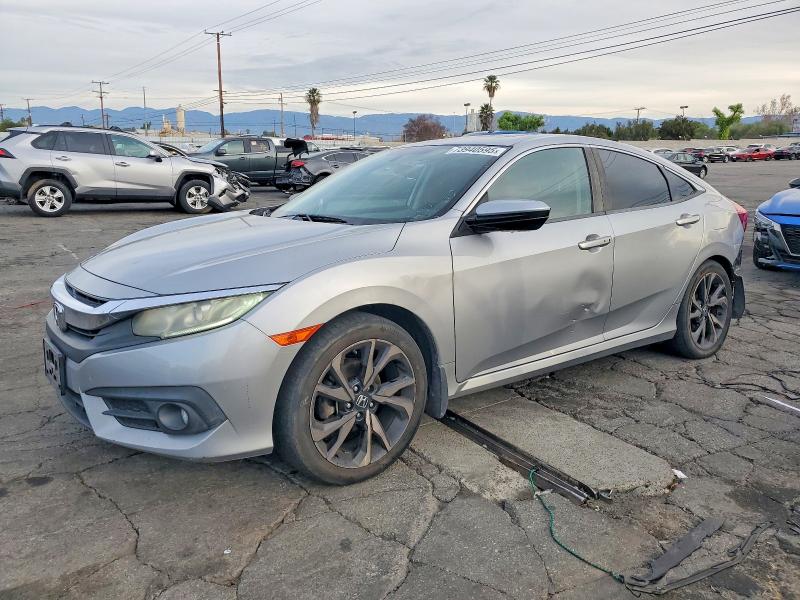HONDA CIVIC 2016 with VIN 2HGFC1F39GH644984 - Photo from auction