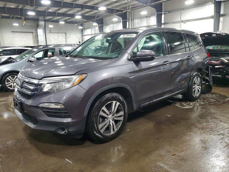 HONDA PILOT EXL 2018 with VIN 5FNYF6H58JB040060 - Photo from auction