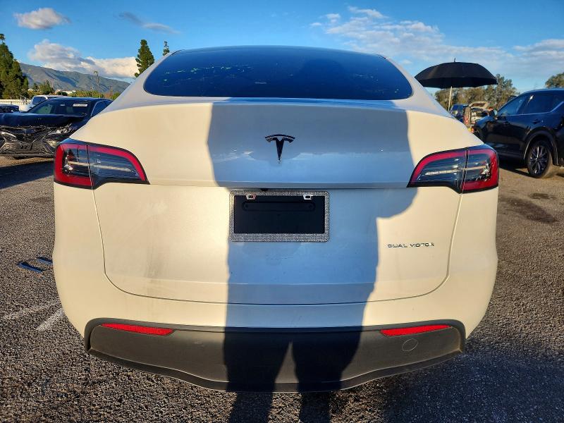 Photo 6 from auction – 2023 TESLA MODEL Y with VIN 7SAYGAEE5PF713130