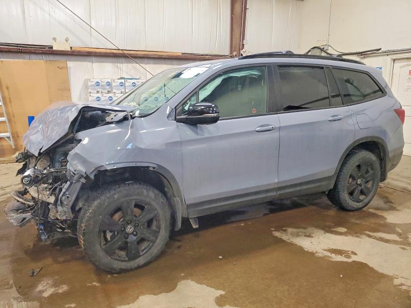 HONDA PILOT TRAI 2022 with VIN 5FNYF6H84NB503554 - Photo from auction