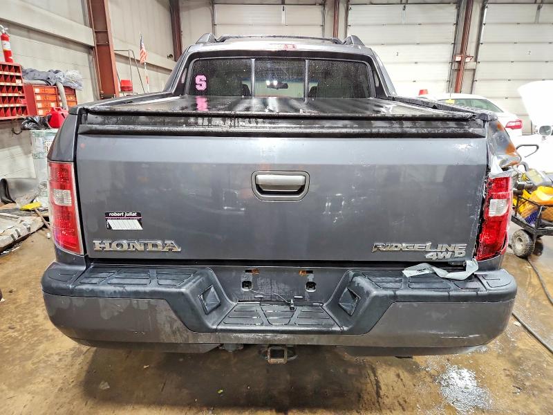 Photo 6 from auction – 2010 HONDA RIDGELINE with VIN 5FPYK1F43AB005393