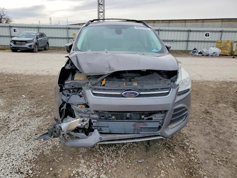 Photo 5 from auction – 2013 FORD ESCAPE with VIN 1FMCU0H98DUA71414