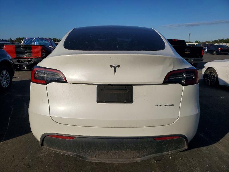 Photo 6 from auction – 2023 TESLA MODEL Y with VIN 7SAYGAEE3PF772435