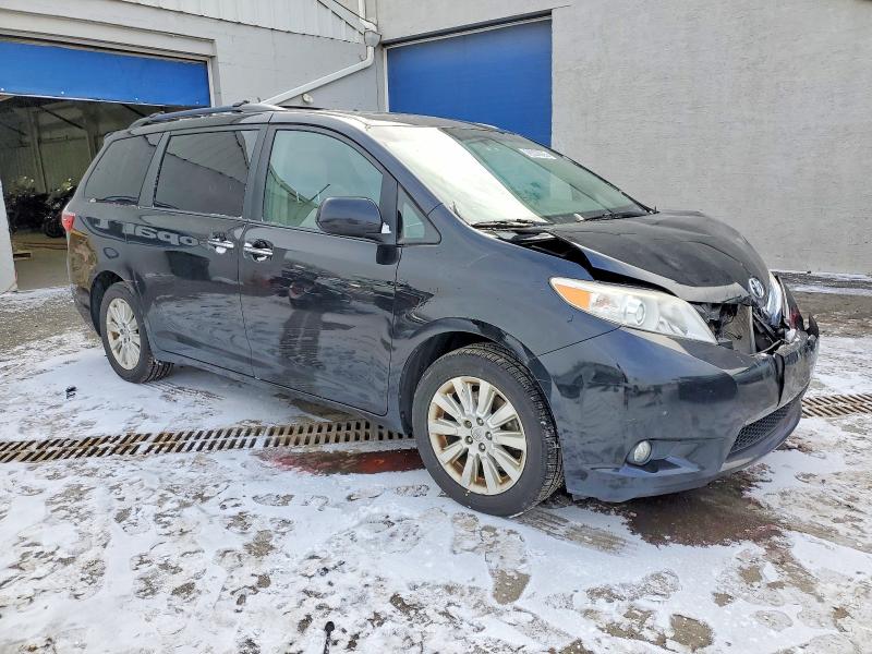 Photo 4 from auction – 2015 TOYOTA SIENNA XLE with VIN 5TDDK3DC4FS105468