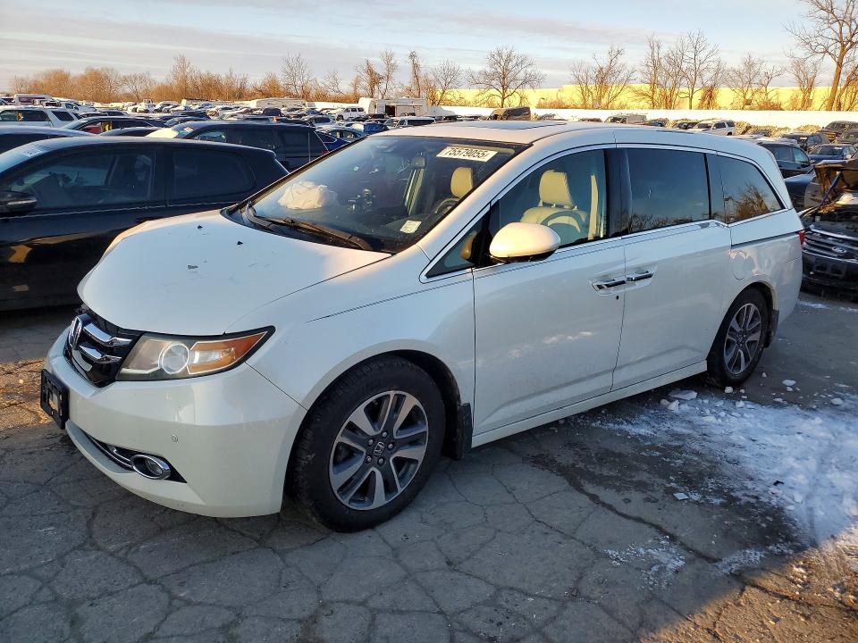 Photo 1 from auction – 2014 HONDA ODYSSEY TO with VIN 5FNRL5H91EB080836
