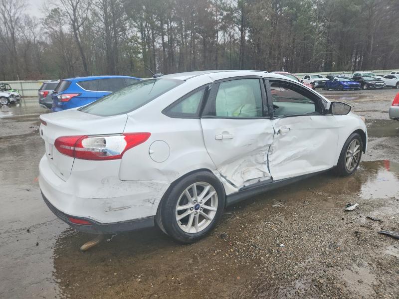 Photo 3 from auction – 2018 FORD FOCUS SE with VIN 1FADP3F21JL224004